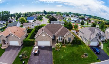 Overhead view of a home in a neighborhood.