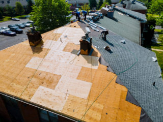 Roofing crew working on a roof.