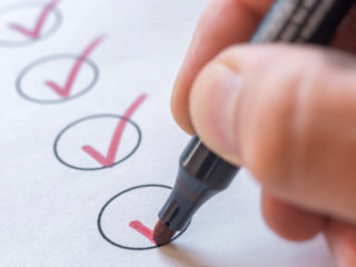 person completing tasks in a crm for contractors