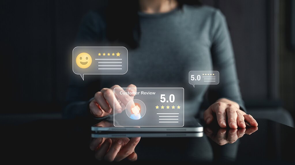 person interacting with customer reviews