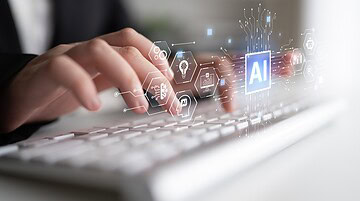 person typing with AI features showing